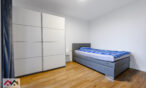 Cozy bedroom with a single bed and access to the balcony