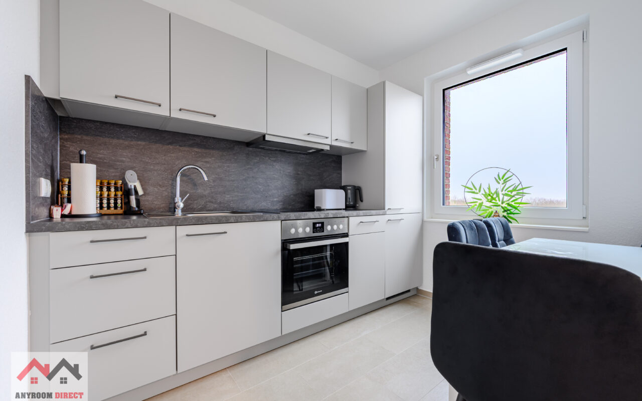 Fully equipped modern kitchen with appliances